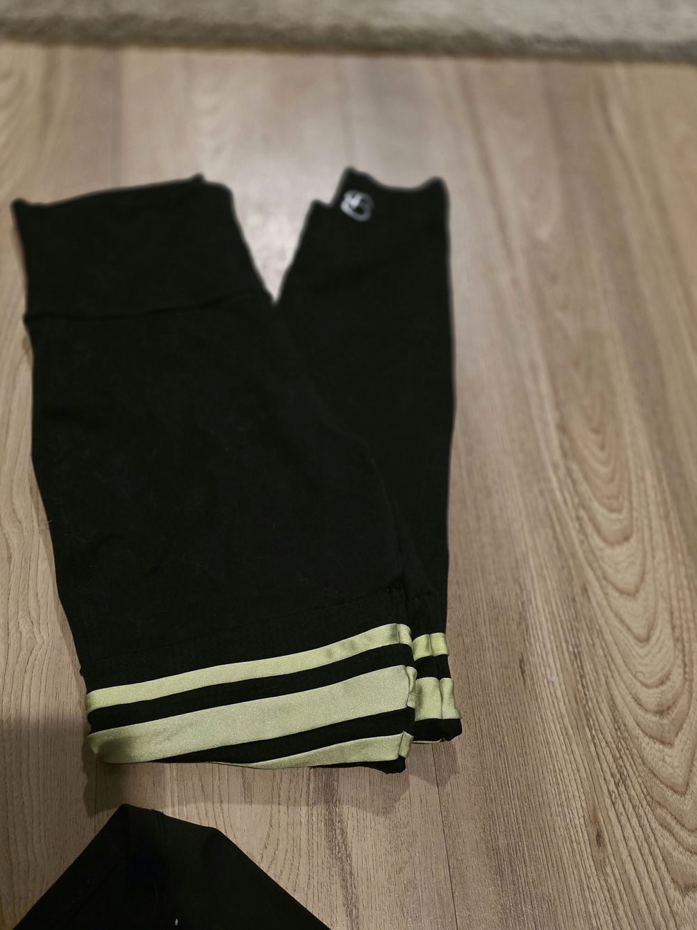 Bombshell Sportswear Black Leggings with Lime Accent Stripes